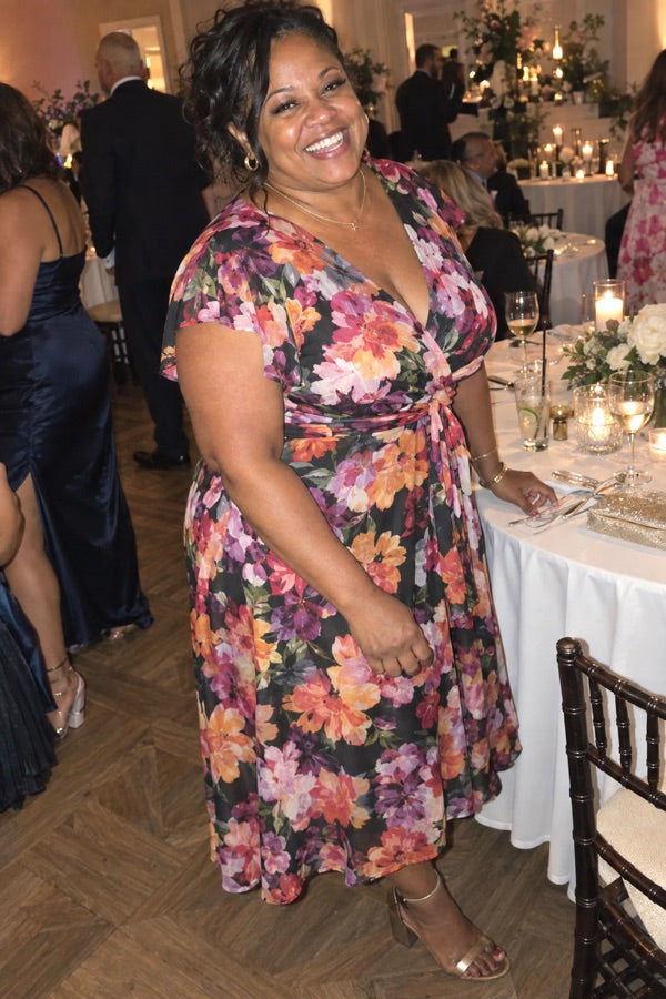 Customer photo of Vanessa Williams in a floral wrap dress at a wedding