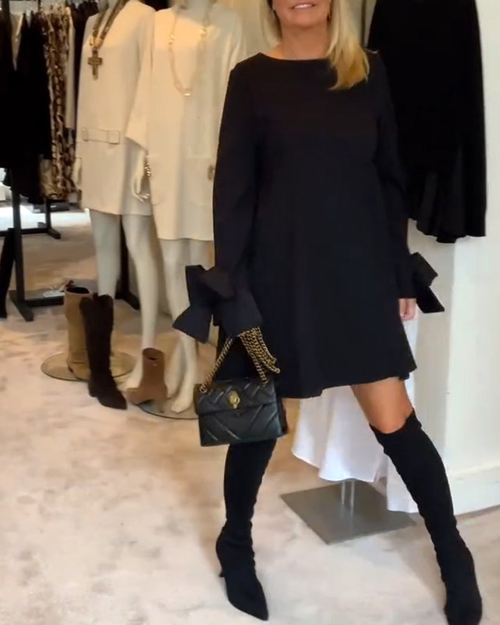 NIA – ELEGANT BOW-SLEEVE MINI DRESS