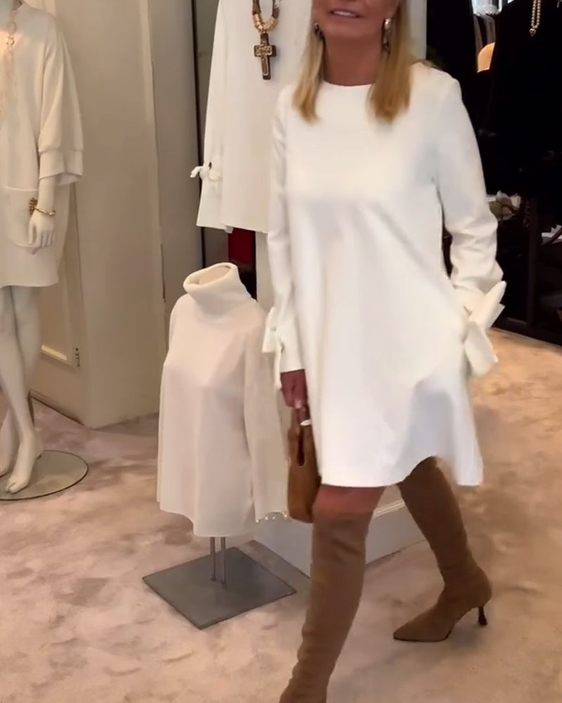 NIA – ELEGANT BOW-SLEEVE MINI DRESS