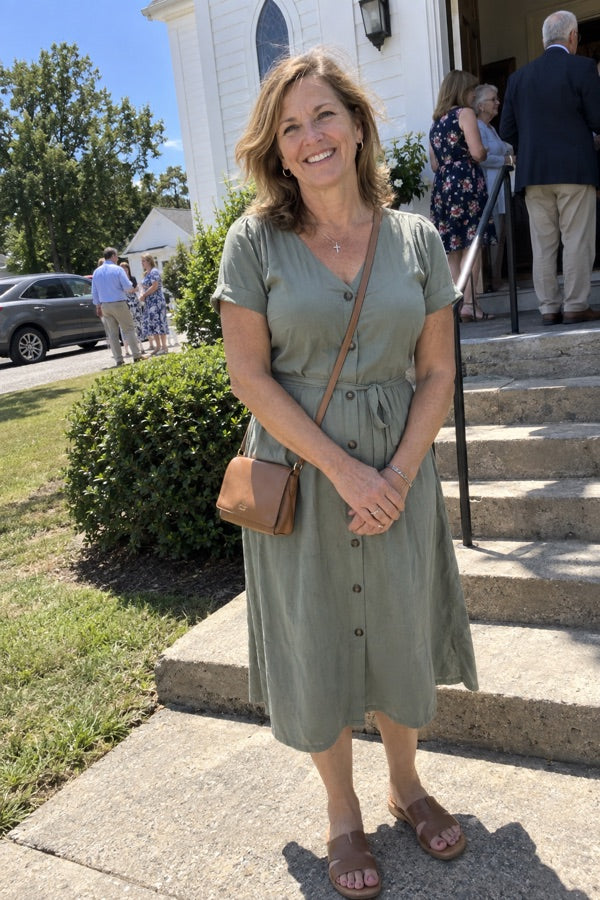 Customer photo of Katherine Moore in a sage button-front midi dress outside church